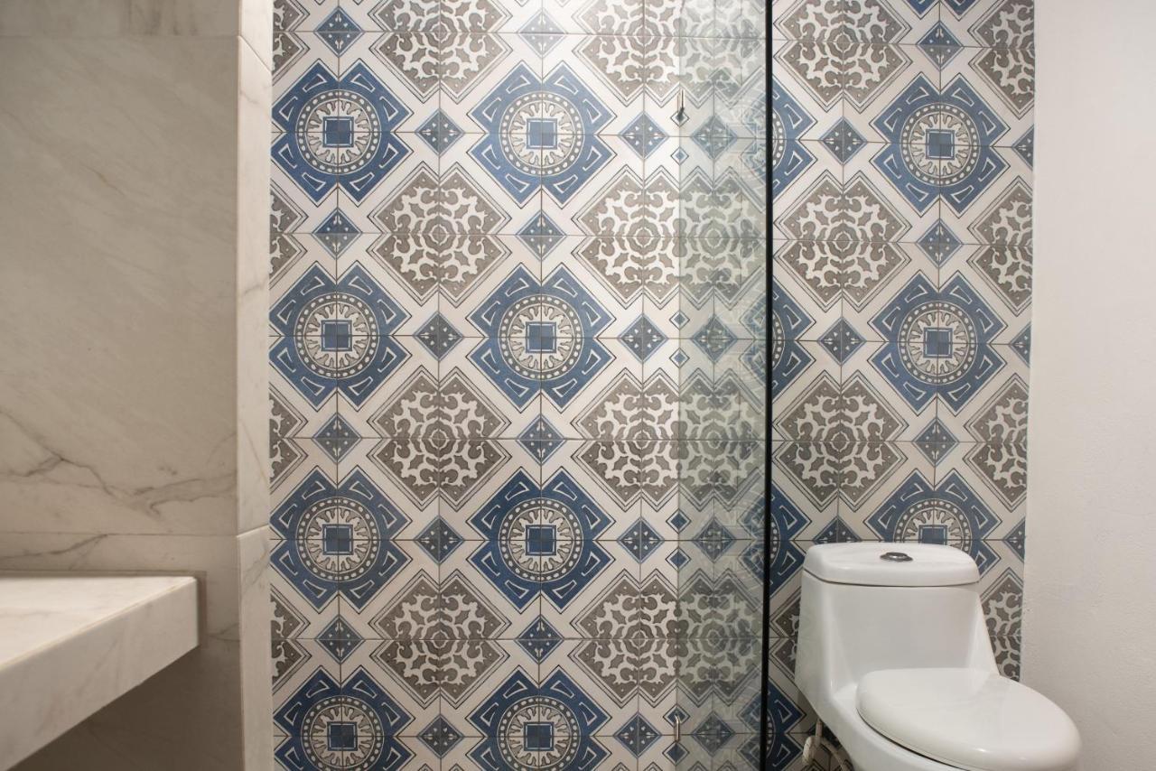Hotel Mayari Holbox Ilha Holbox Exterior foto Bathroom tiles